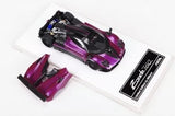 Purple 1/64 scale diecast sports car model toy in open packaging insert