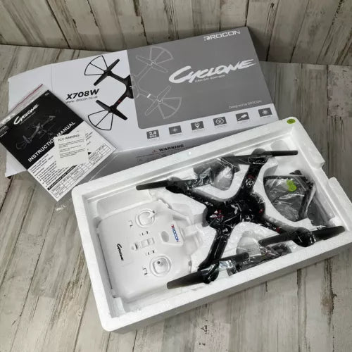 Drocon Cyclone X708W beginner quadcopter drone kit in packaging, with four propellers