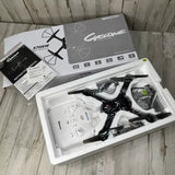 Drocon Cyclone X708W beginner quadcopter drone kit in packaging, with four propellers