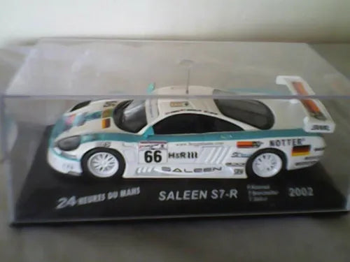 White and light-blue diecast race car model in display box, #66 livery