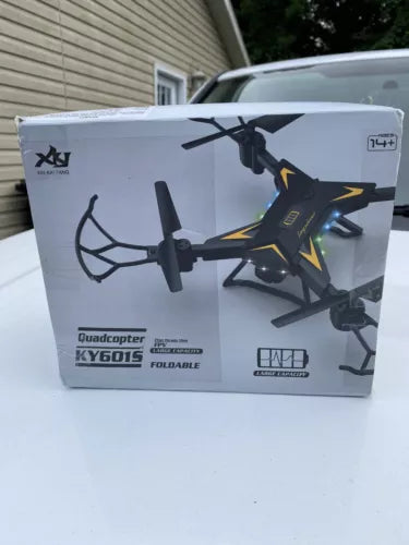 Foldable quadcopter drone retail box with printed drone and foldable design