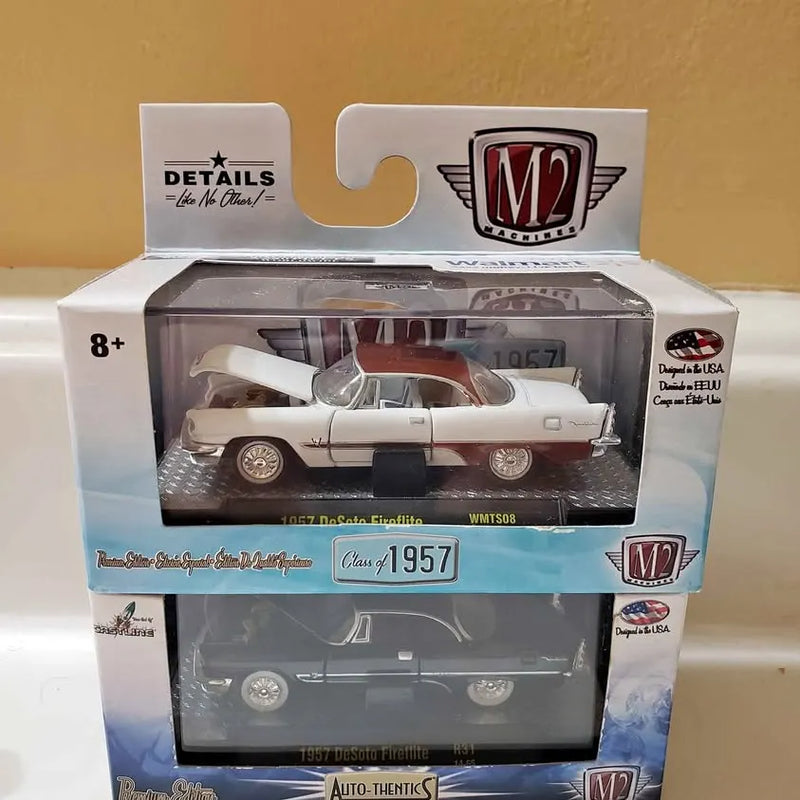 1:64 diecast car model in box, white with dark details and black stripe