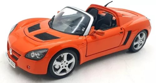 Orange diecast convertible sports car model, open cockpit, front and side view