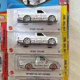 1/64 diecast blister set: two GMC Syclone and one Ford F-150 Lightning truck