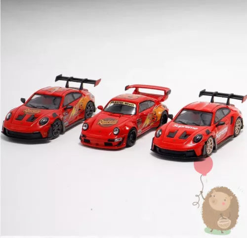 Red alloy diecast Porsche model cars, three-piece set with rear wings