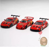 Red alloy diecast Porsche model cars, three-piece set with rear wings