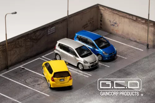 1:64 diecast model cars set with yellow, white, and blue vehicles in parking view