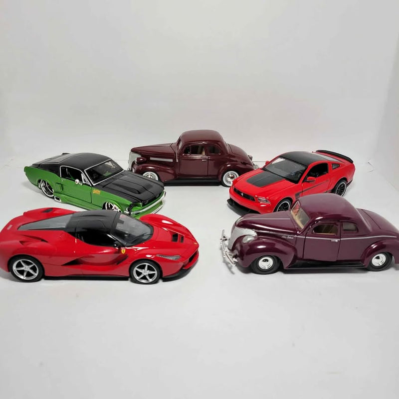 1:24 diecast car lot, five vehicles in red, green, maroon, and purple