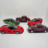 1:24 diecast car lot, five vehicles in red, green, maroon, and purple