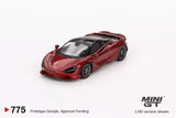 Red 1/64 diecast sports car model with black wheels and tinted windows (LHD)