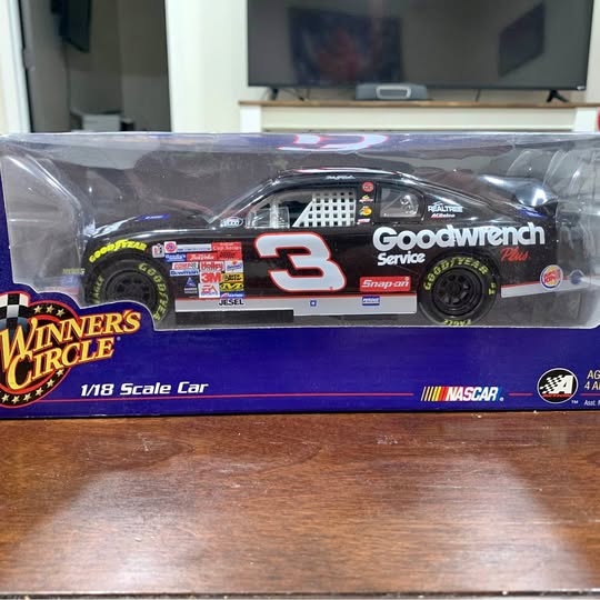 Diecast NASCAR race car, black with red number 3, Goodwrench logo in display box