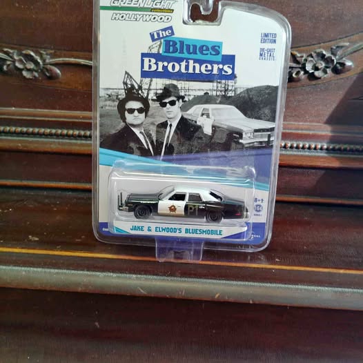 Diecast Bluesmobile model car in clear blister, black and silver