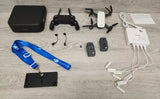 Drone controller and accessory set with batteries, cables, and carrying case