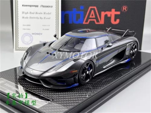 Diecast model car, carbon black with blue racing stripes, front three-quarter view