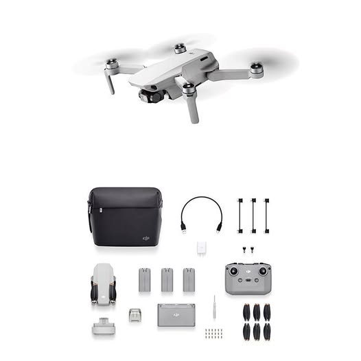 Quadcopter drone with controller, prop guards, and carrying case
