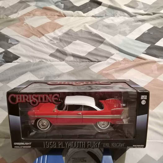 1:24 scale diecast Christine Plymouth Fury car, red and white, boxed