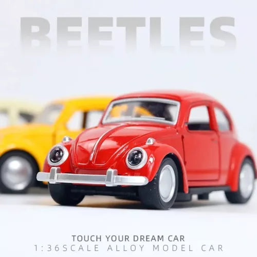 Red retro Beetle diecast model car front view, 1:36 scale