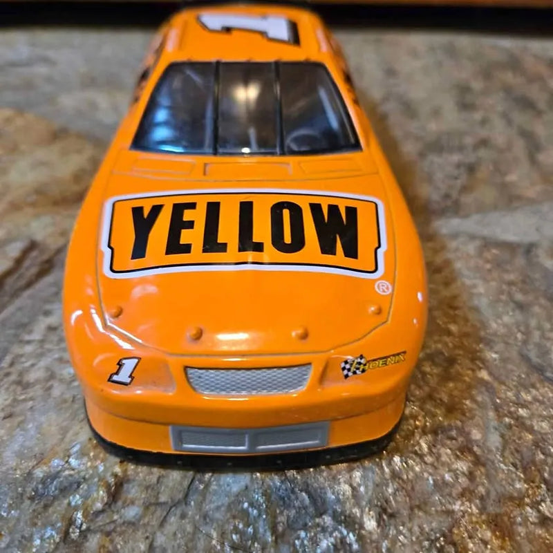 1:24 diecast 2000 Chevrolet Monte Carlo front in bright orange, 'YELLOW' hood decal