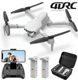 White RC quadcopter drone with black propellers and remote controller
