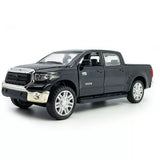 1:36 black diecast pickup truck model toy with Toyota logo and detailed grille