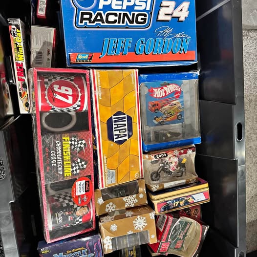 NASCAR diecast collectible box set with boxed race cars and accessories