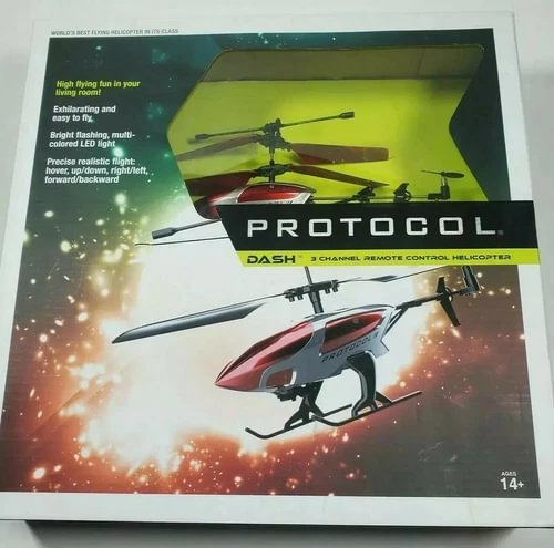 Remote controlled helicopter drone with red and black body, spinning rotor blades