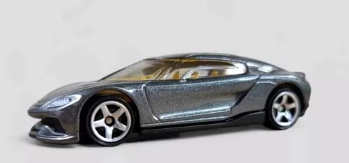 Gray die-cast model car, side view, metallic body and silver wheels
