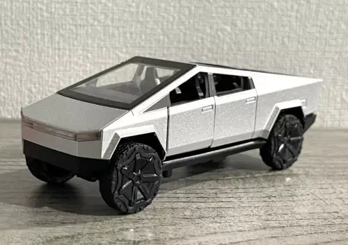 Silver 1:36 diecast pickup truck model with black wheels