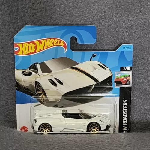 White diecast model sports car in Hot Wheels Roadsters package