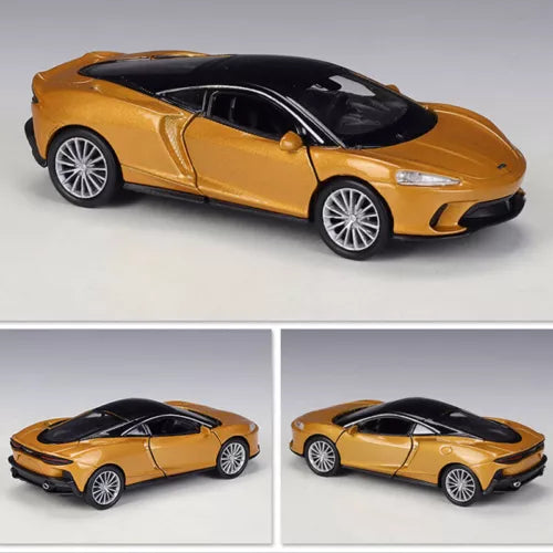 Gold sports diecast model car with black hood, front three-quarter view, silver wheels