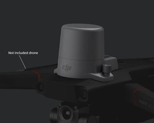 Gray RTK module mounted on drone base with cylindrical antenna dome