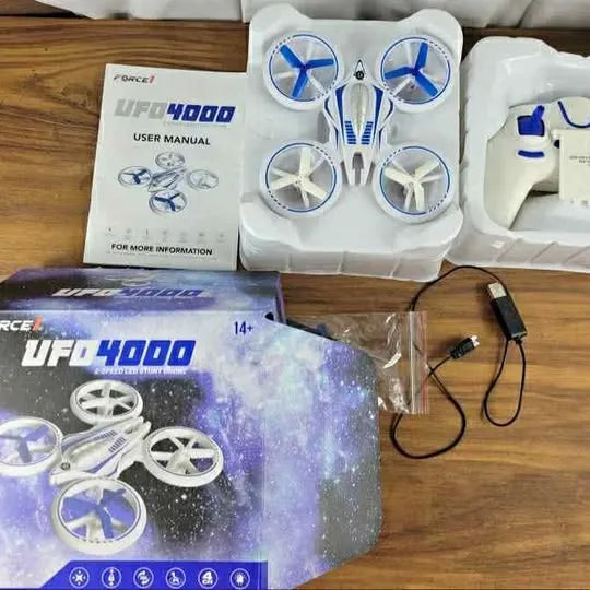 UFO 4000 stunt drone kit with propeller guards and USB charging cable