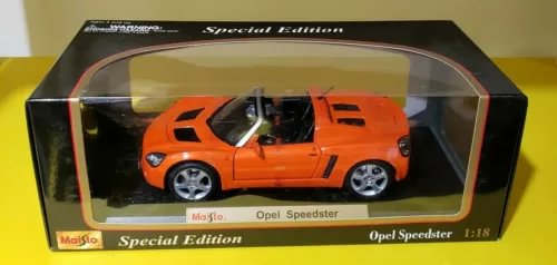 Orange Opel Speedster 1:18 diecast car with black detailing, in display box