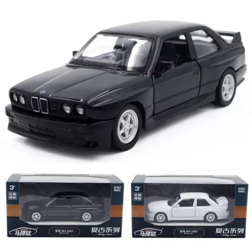 Black diecast coupe model car with alloy wheels, front 3/4 view.