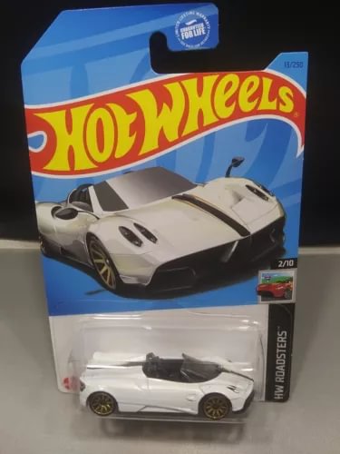 White Hot Wheels diecast roadster model in blister pack, gold wheels