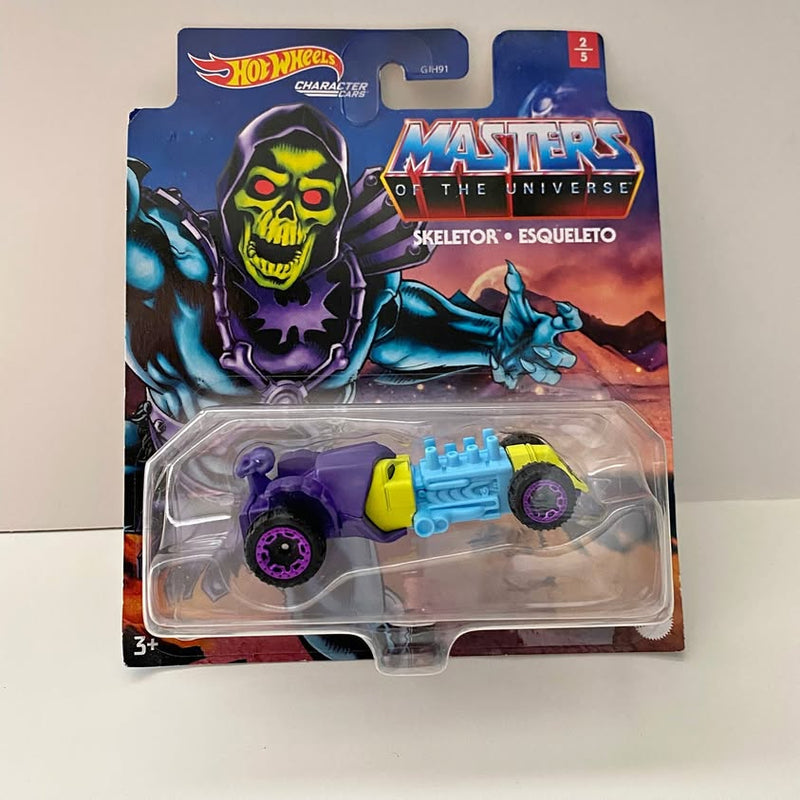 Purple and yellow Skeletor-themed Hot Wheels diecast car with blue engine detail