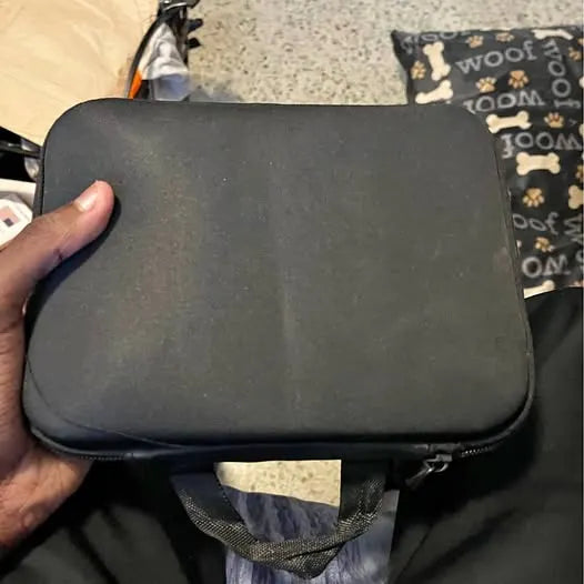 Black zippered drone carrying case with handle and front mesh pocket