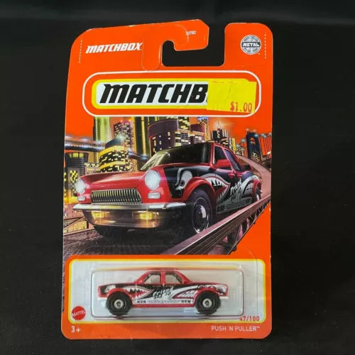 Red classic diecast car in orange Matchbox blister pack, Push N Puller, age 3+