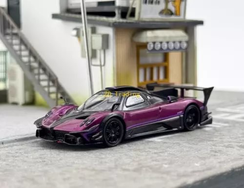 Purple and black diecast race car model with rear spoiler