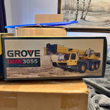 Diecast model toy truck on display in branded retail box, Grove GMK3055