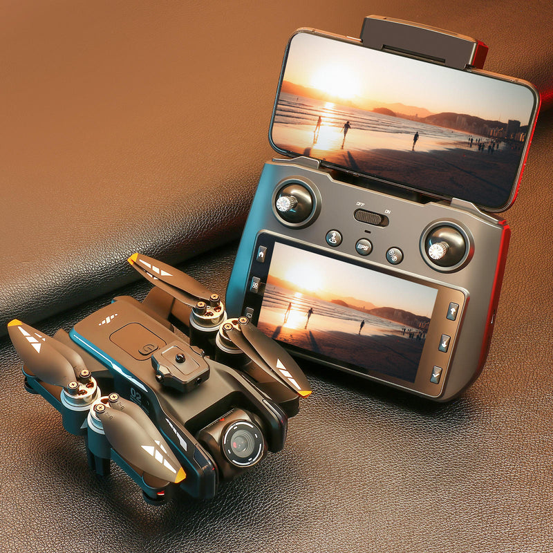 Foldable quadcopter drone in turquoise and dark gray with remote controller and screens.