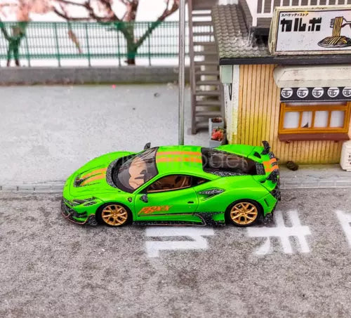 Green racing sports car diecast model with black wheels and racing decals
