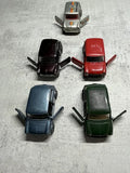 Five Mini diecast cars 1/36 some need a bit of help, o.k. cond,see pics. Toy