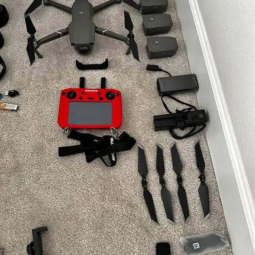 Dji Magic Pro 2 drone and upgrade remote kit with red controller, spare battery and props