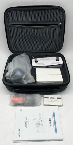 Black drone carrying case with compact drone, batteries, blades, and instruction papers