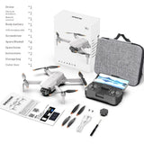 White quadcopter drone with remote controller and gray carrying case, plus spare parts kit