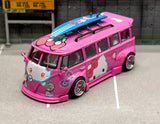Pink VW T1 camper van diecast toy car with cartoon graphics and blue roof