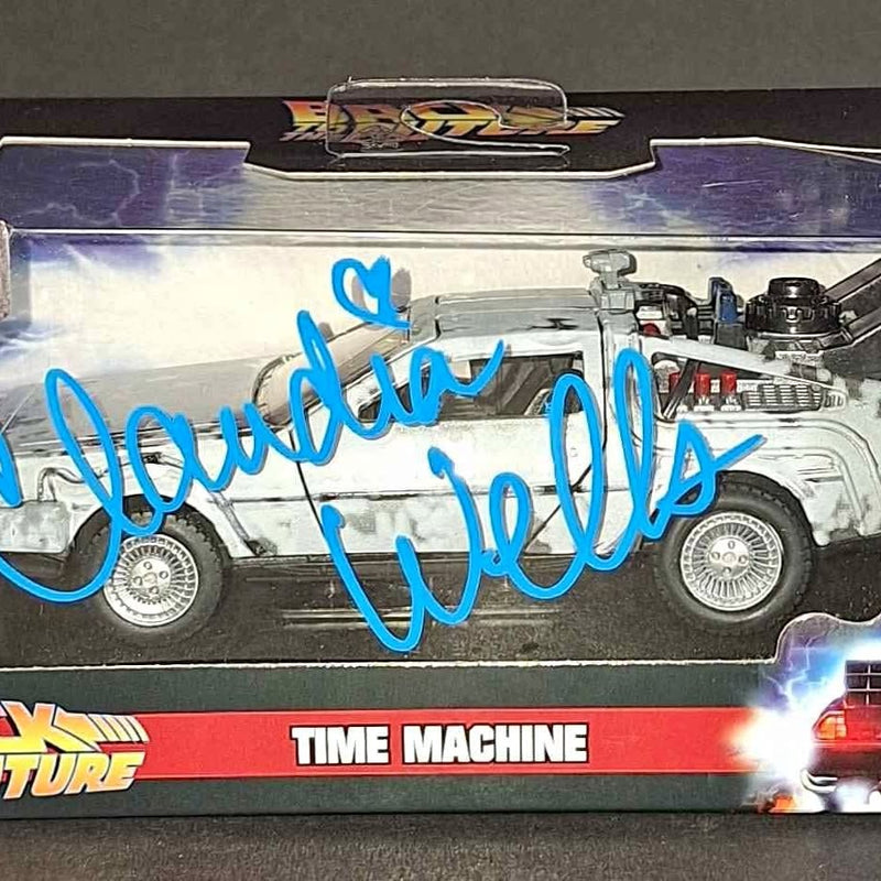 1:32 diecast DeLorean car with blue autograph on side