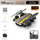 Gray and yellow quadcopter drone with camera and four propellers