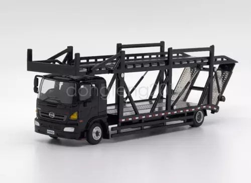 Black diecast metal transport truck with flatbed and rail cage